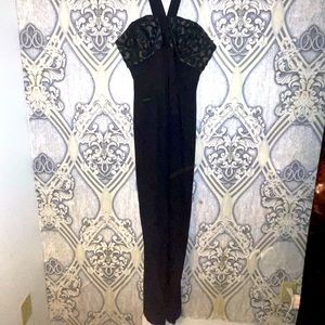 Black halter style floor length dress. Stunning!